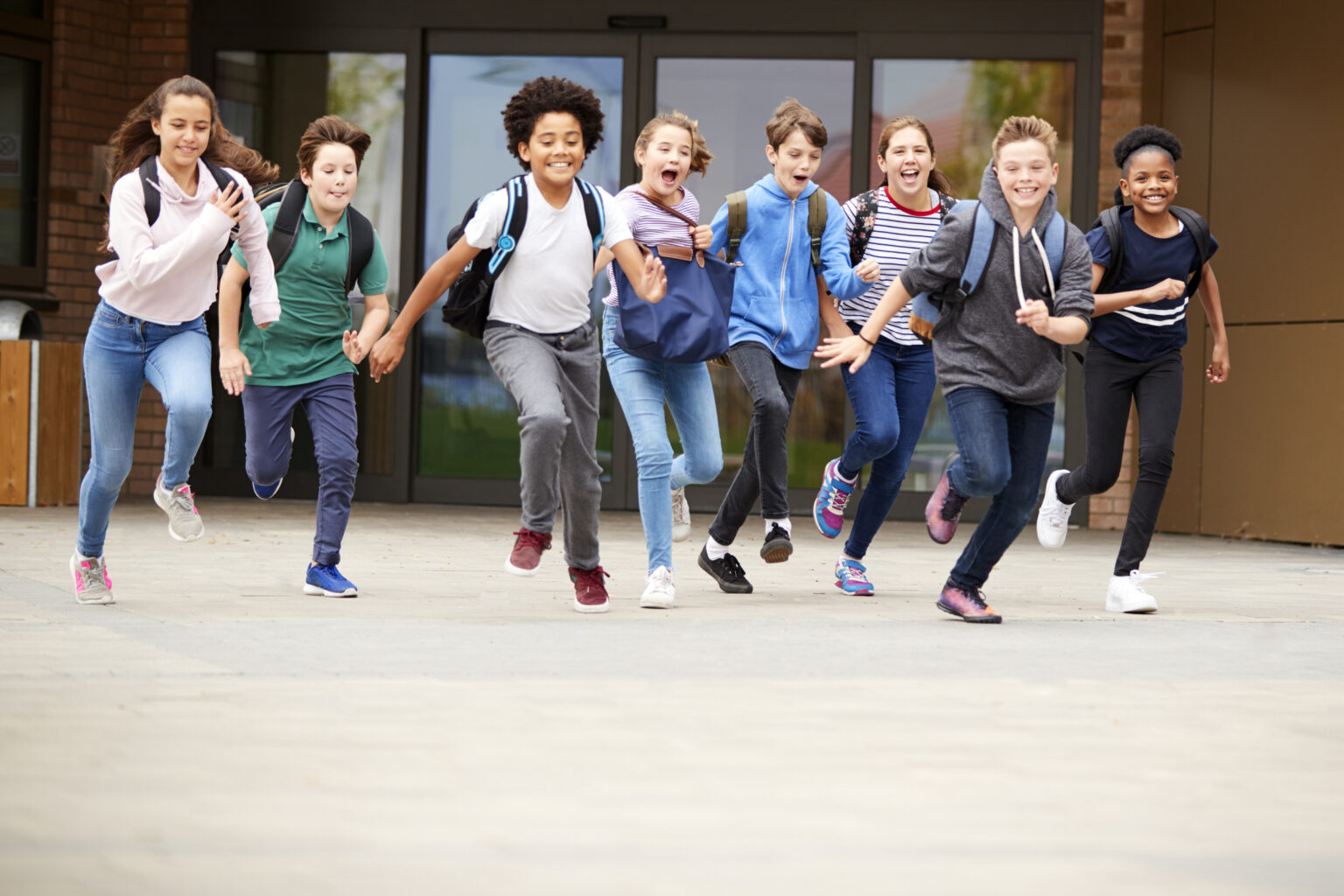 students running towards camera